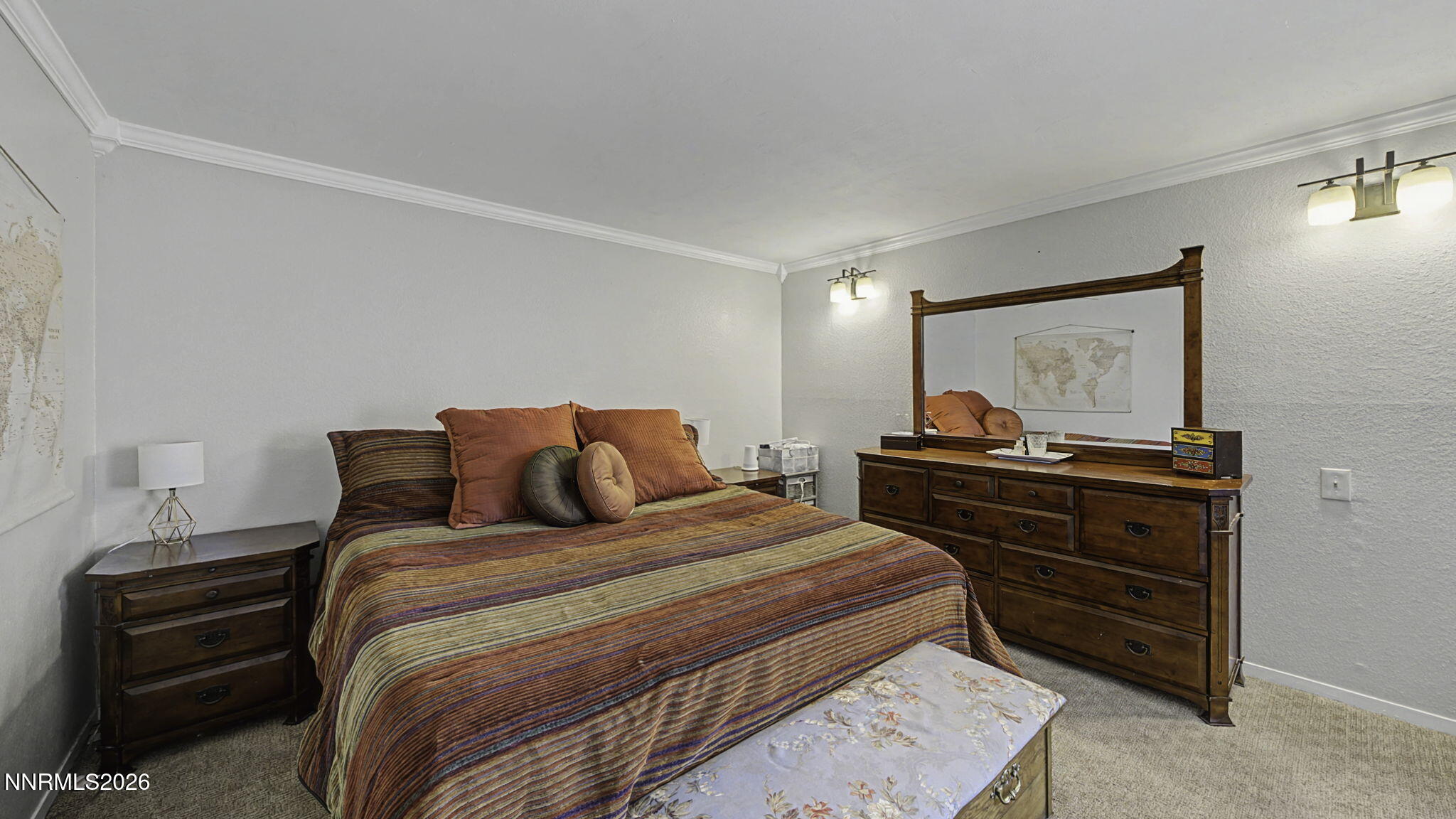 10585 Silver Knolls Boulevard Reno, NV 89508 - Photo 23 of 50 a bedroom with a bed and dresser