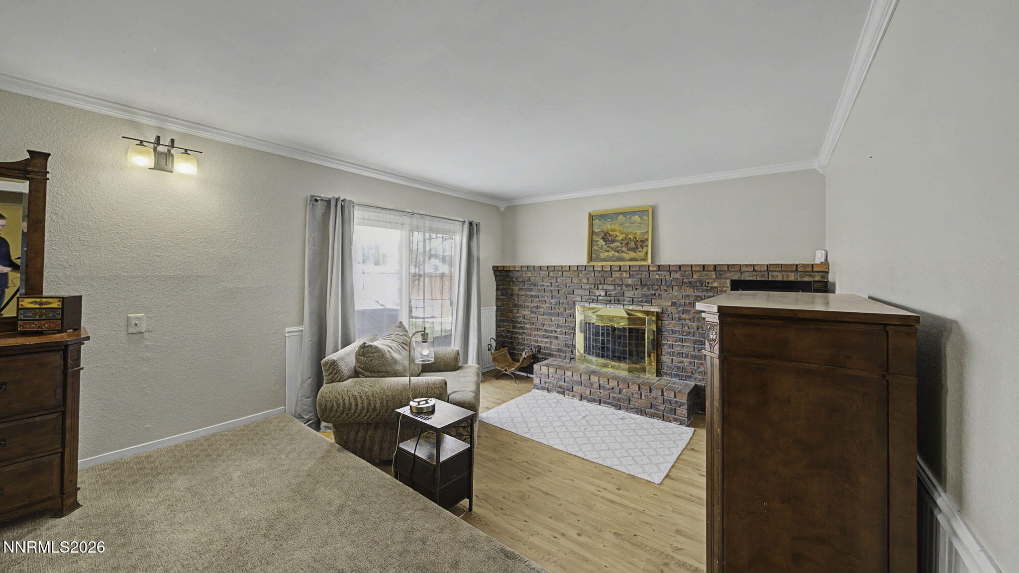 10585 Silver Knolls Boulevard Reno, NV 89508 - Photo 24 of 50 a living room with furniture and a fireplace