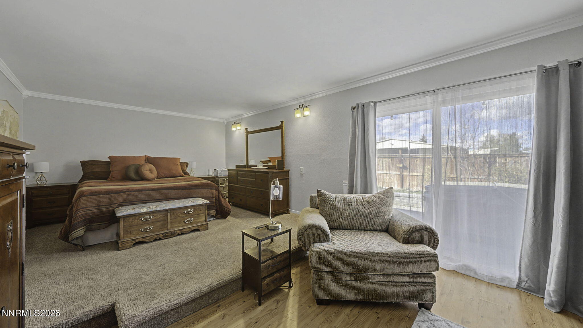 10585 Silver Knolls Boulevard Reno, NV 89508 - Photo 25 of 50 a bedroom with furniture and a window