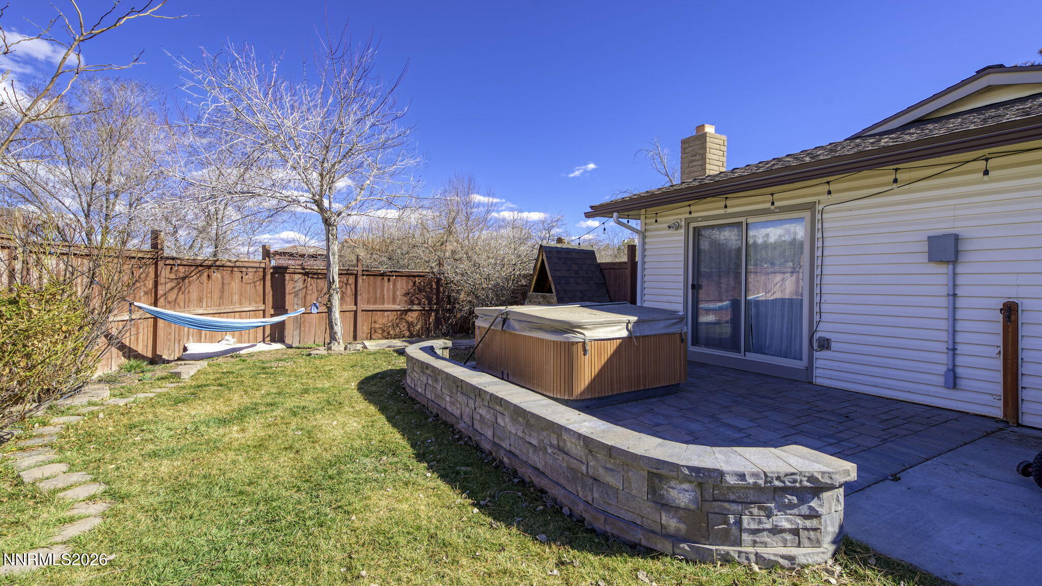 10585 Silver Knolls Boulevard Reno, NV 89508 - Photo 36 of 50 a view of a roof deck with couches chairs and wooden floor