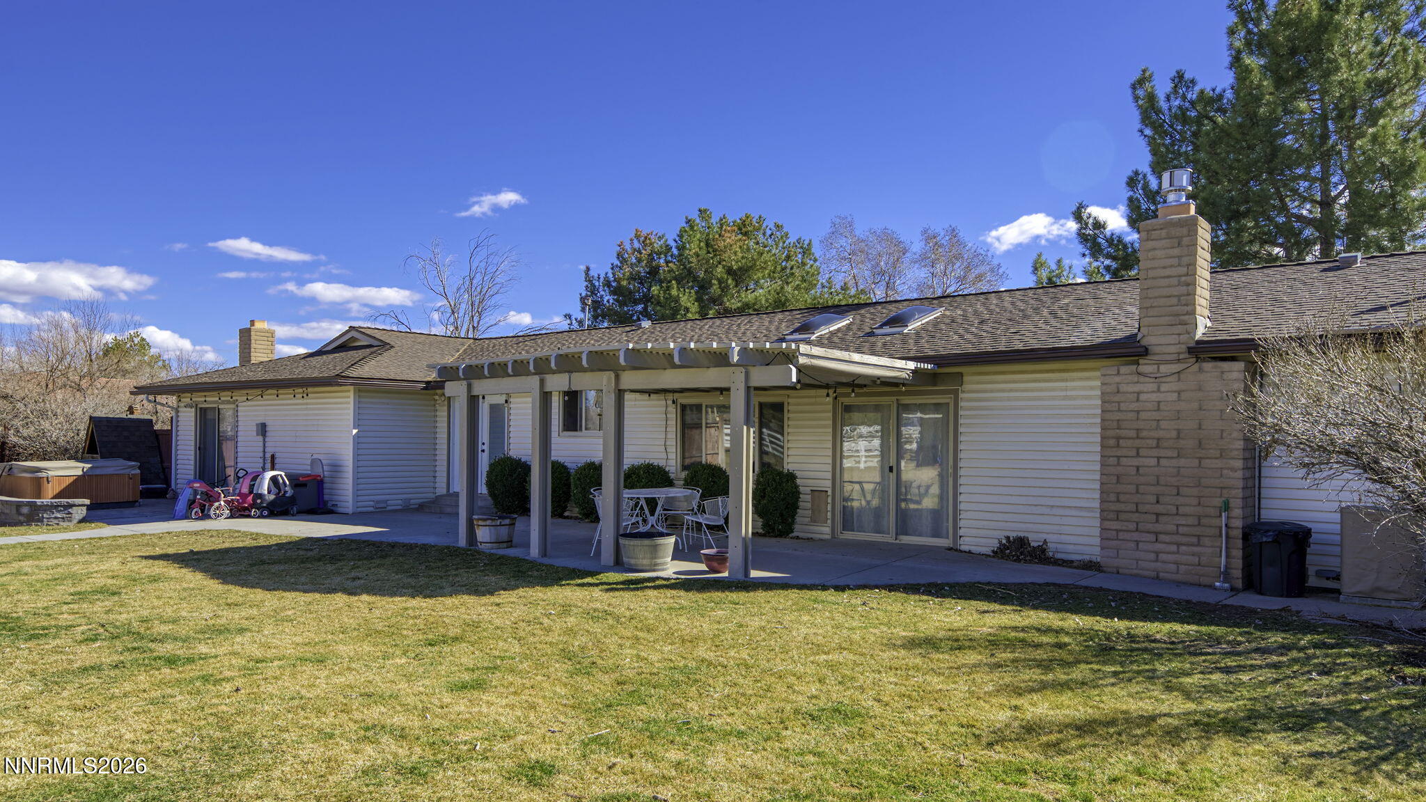 10585 Silver Knolls Boulevard Reno, NV 89508 - Photo 39 of 50 a view of a house with swimming pool and a yard