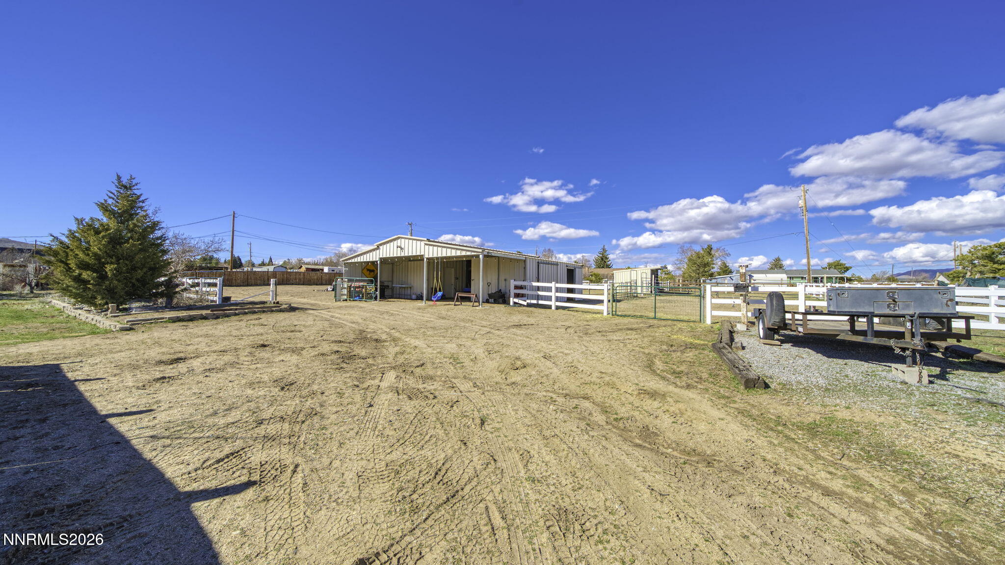 10585 Silver Knolls Boulevard Reno, NV 89508 - Photo 43 of 50 a view of a yard with cars parked