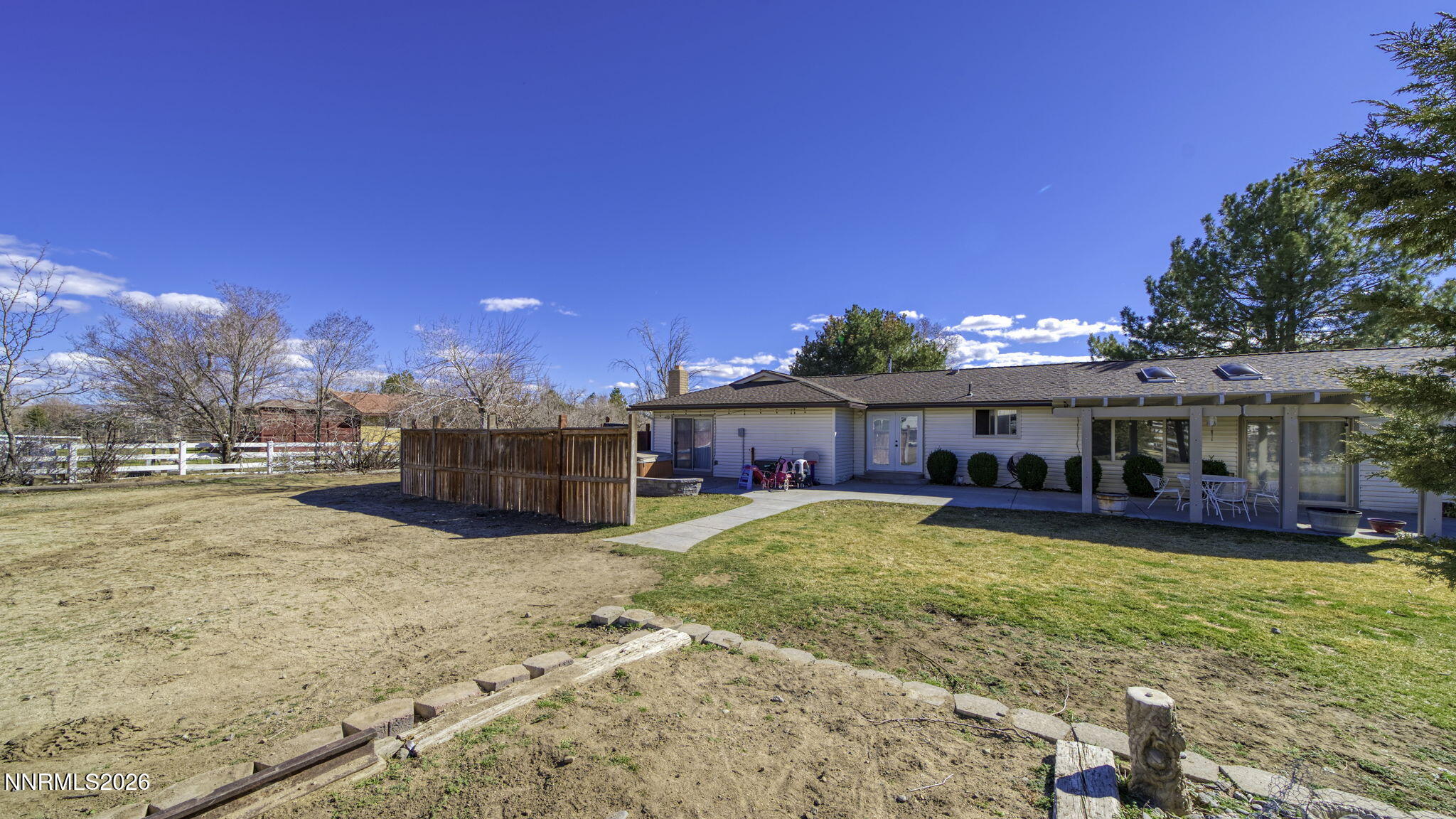 10585 Silver Knolls Boulevard Reno, NV 89508 - Photo 48 of 50 a view of a house with a yard and sitting area