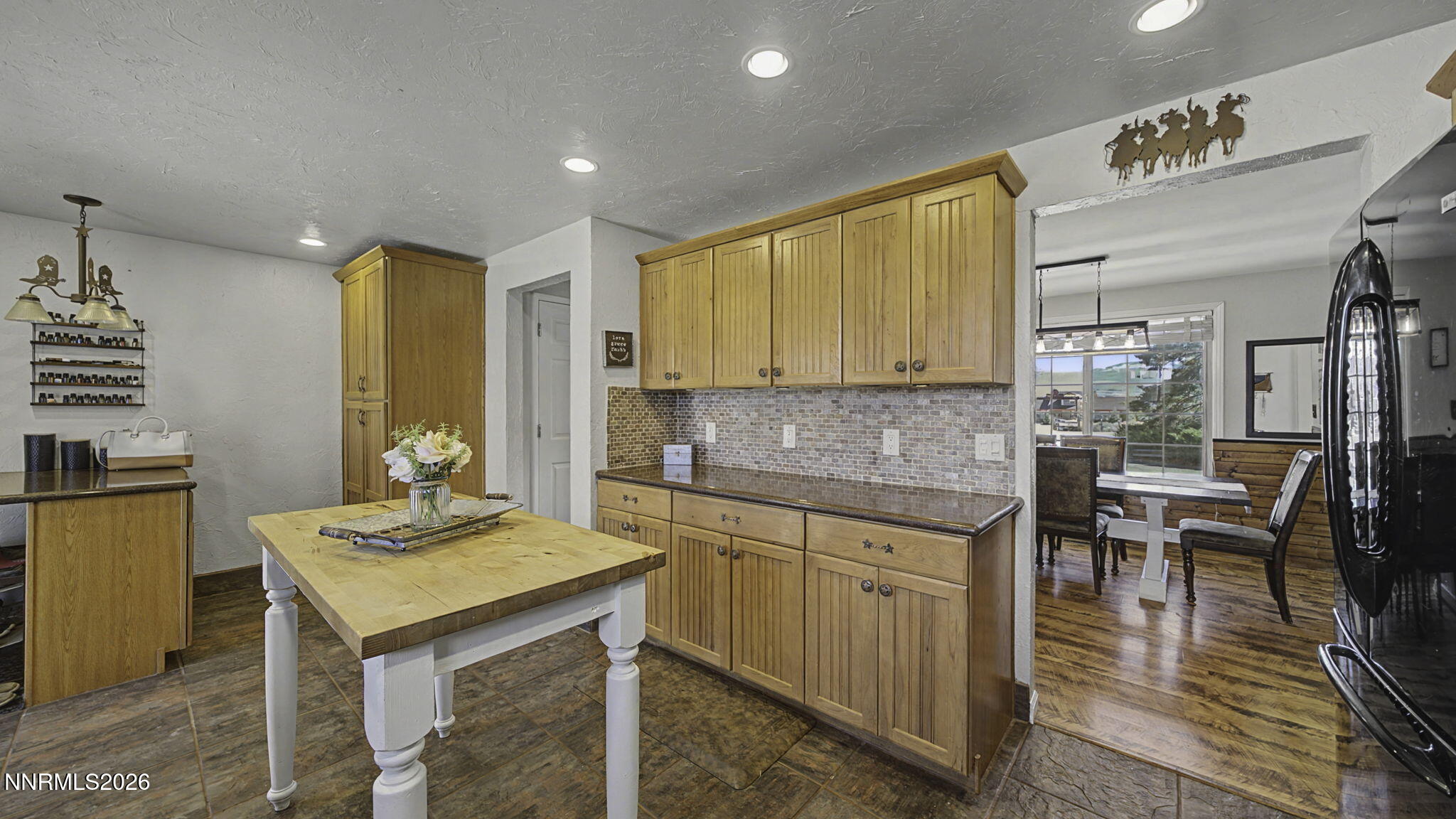 10585 Silver Knolls Boulevard Reno, NV 89508 - Photo 5 of 50 a kitchen with a sink cabinets and wooden floor