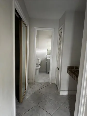 a bathroom with a sink and toilet
