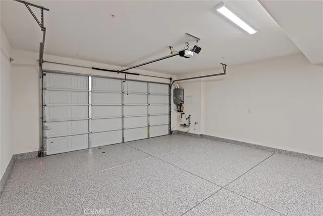 a view of storage and utility room with washer and dryer