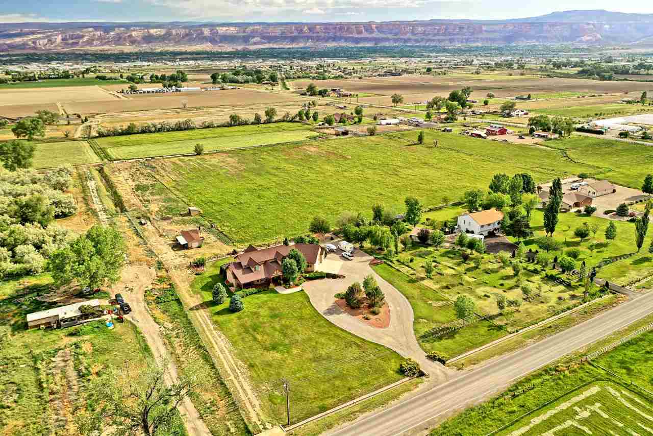 2325 I Road Grand Junction, CO 81505 - Photo 2 of 9 a view of an ocean with a nearby beach