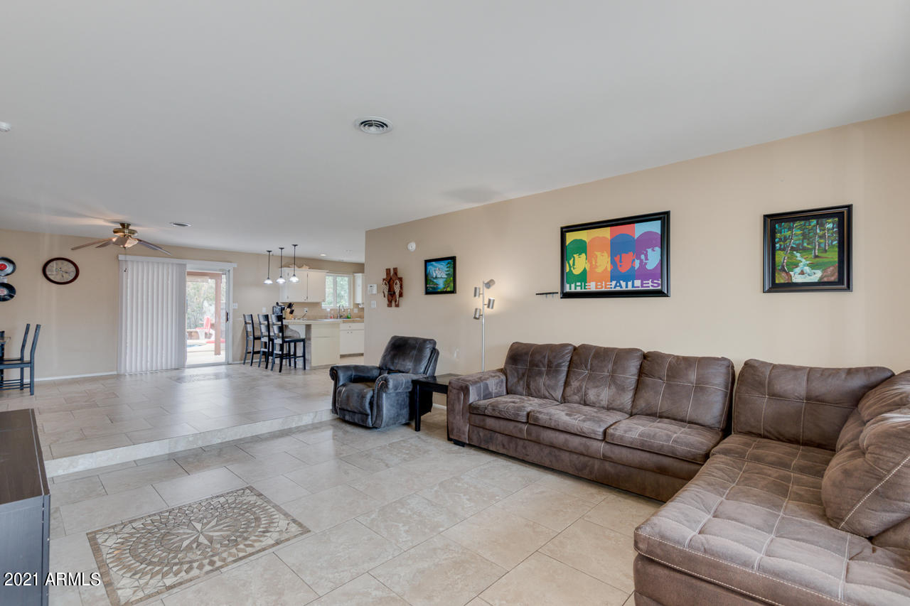 4215 West Dailey Street Phoenix, AZ 85053 - Photo 6 of 32 a living room with furniture and hard wood flooring