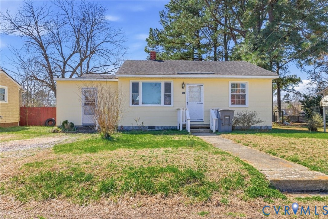 524 Clay Street Wakefield, VA 23888 - Photo 1 of 20 a view of a house with a yard