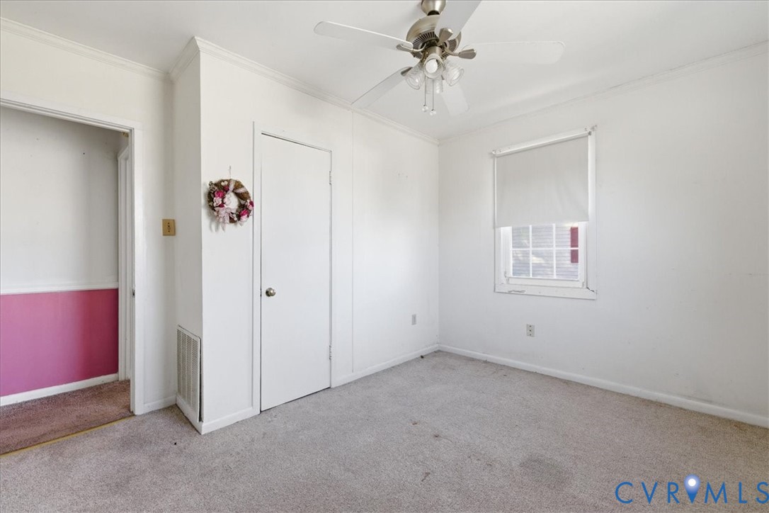 524 Clay Street Wakefield, VA 23888 - Photo 16 of 20 a view of a livingroom with an empty space