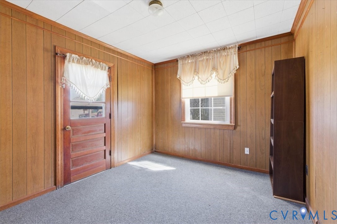 524 Clay Street Wakefield, VA 23888 - Photo 6 of 20 a view of an empty room with a window