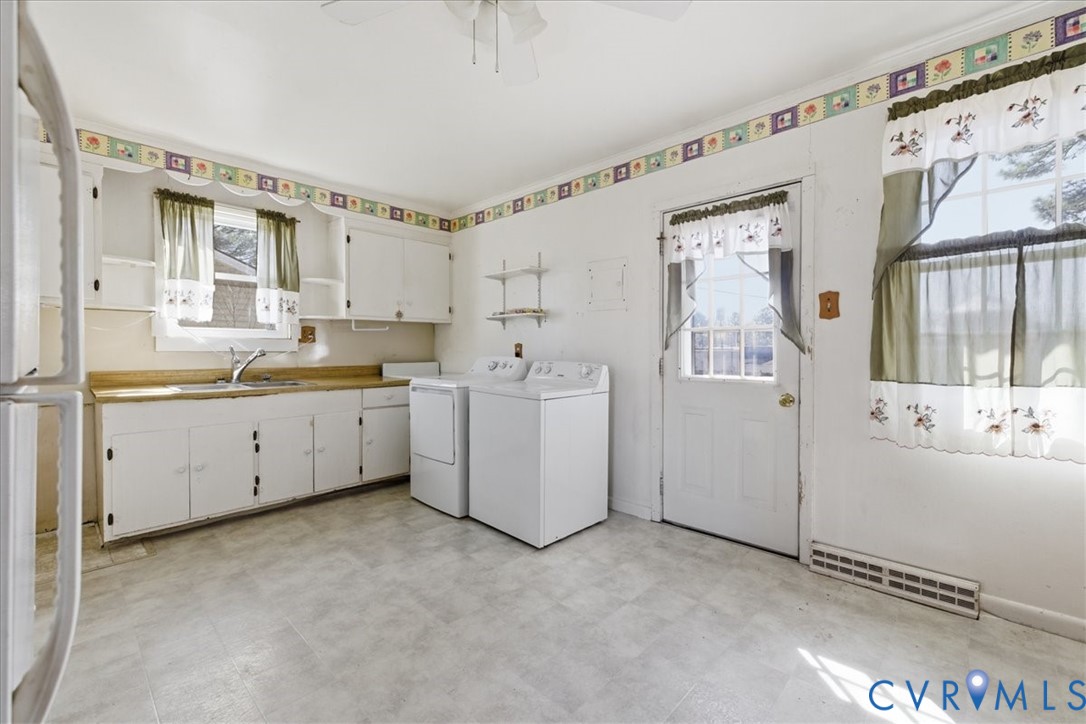 524 Clay Street Wakefield, VA 23888 - Photo 8 of 20 a view of a kitchen with electric appliances
