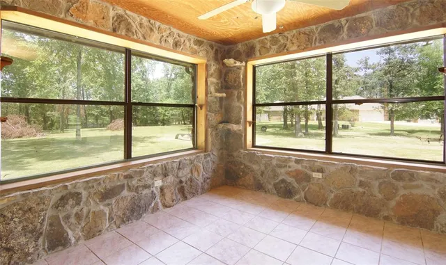 a view of yard with patio