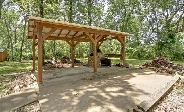 a view of house with a garden