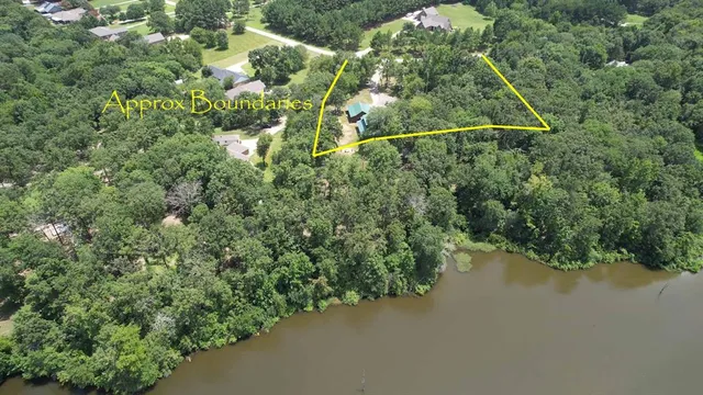 an aerial view of a city with lake view