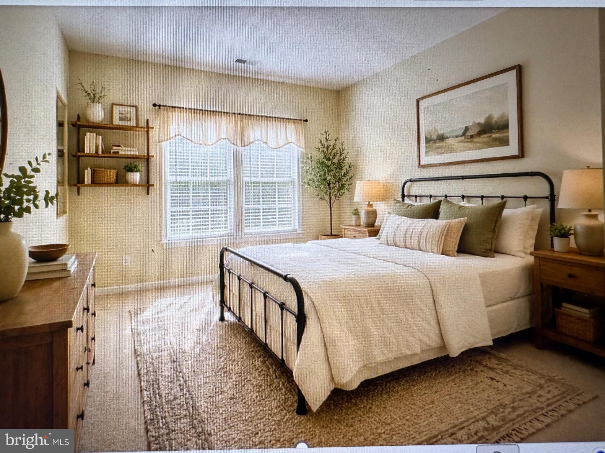9511 Kingscroft Terrace, Unit 9511F Perry Hall, MD 21128 - Photo 35 of 38 a spacious bedroom with a bed a couch and large window