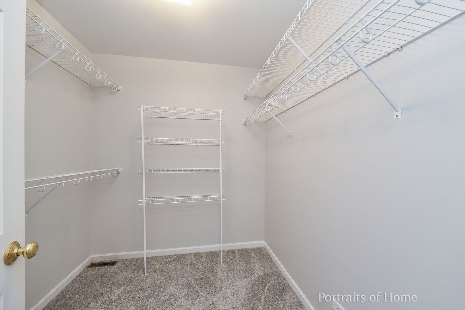 235 Rollin Road, Unit C Somonauk, IL 60552 - Photo 12 of 20 a view of an empty walk in closet