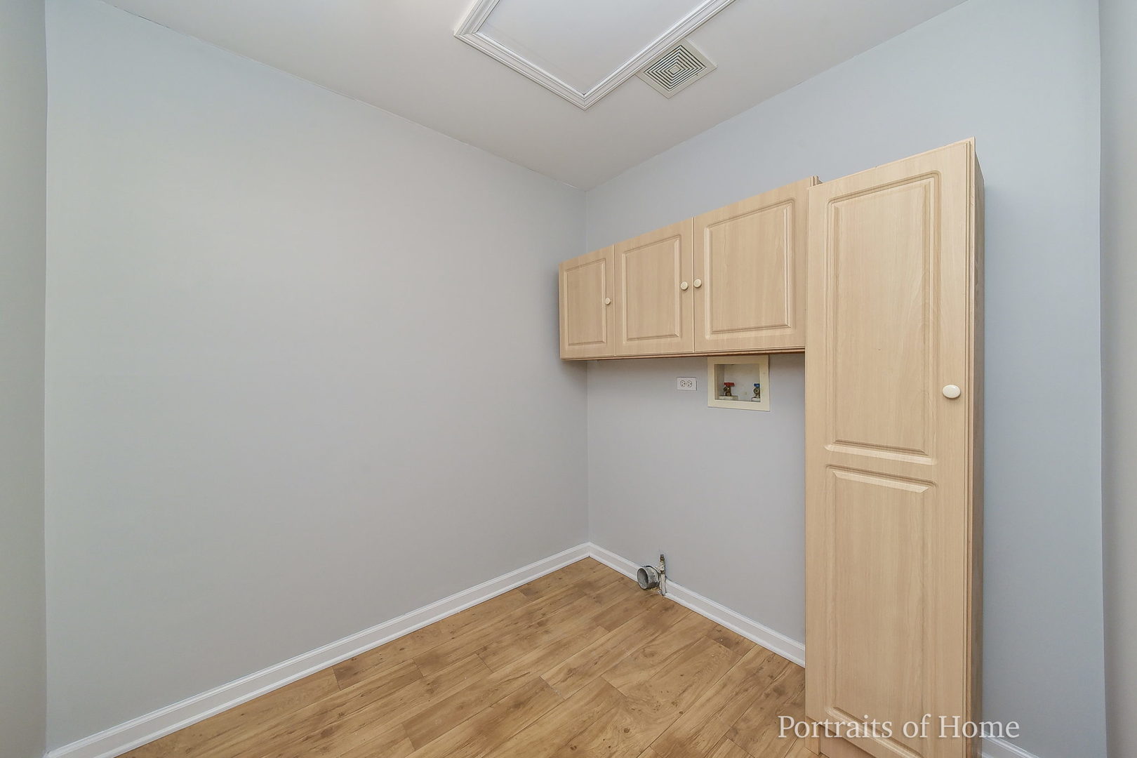 235 Rollin Road, Unit C Somonauk, IL 60552 - Photo 16 of 20 a view of room with cabinets