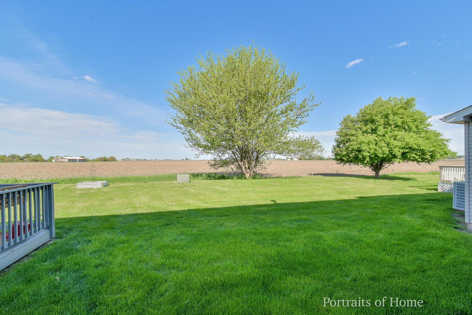 235 Rollin Road, Unit C Somonauk, IL 60552 - Photo 18 of 20 a view of yard with swimming pool and green space