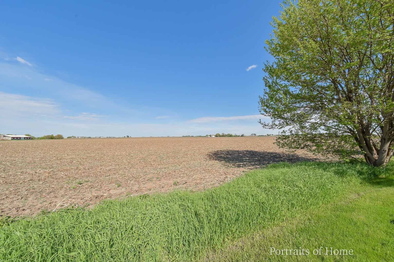 235 Rollin Road, Unit C Somonauk, IL 60552 - Photo 19 of 20 a view of a lake and mountain in the back