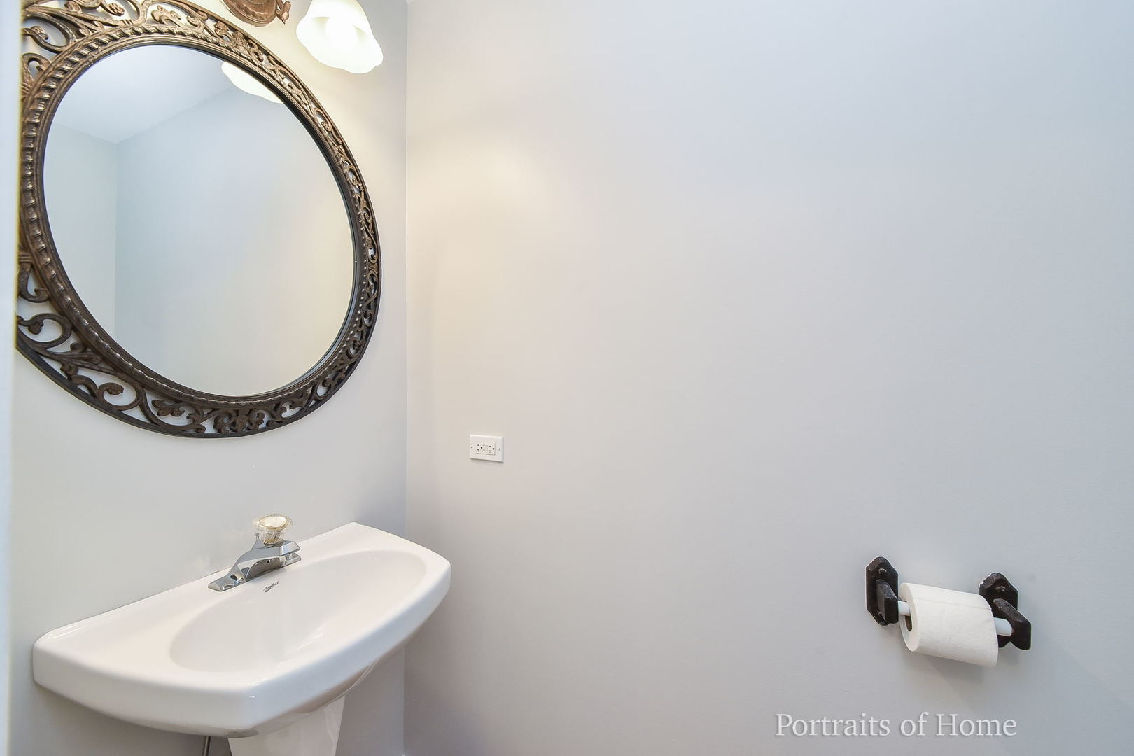 235 Rollin Road, Unit C Somonauk, IL 60552 - Photo 8 of 20 a bathroom with a sink and a mirror