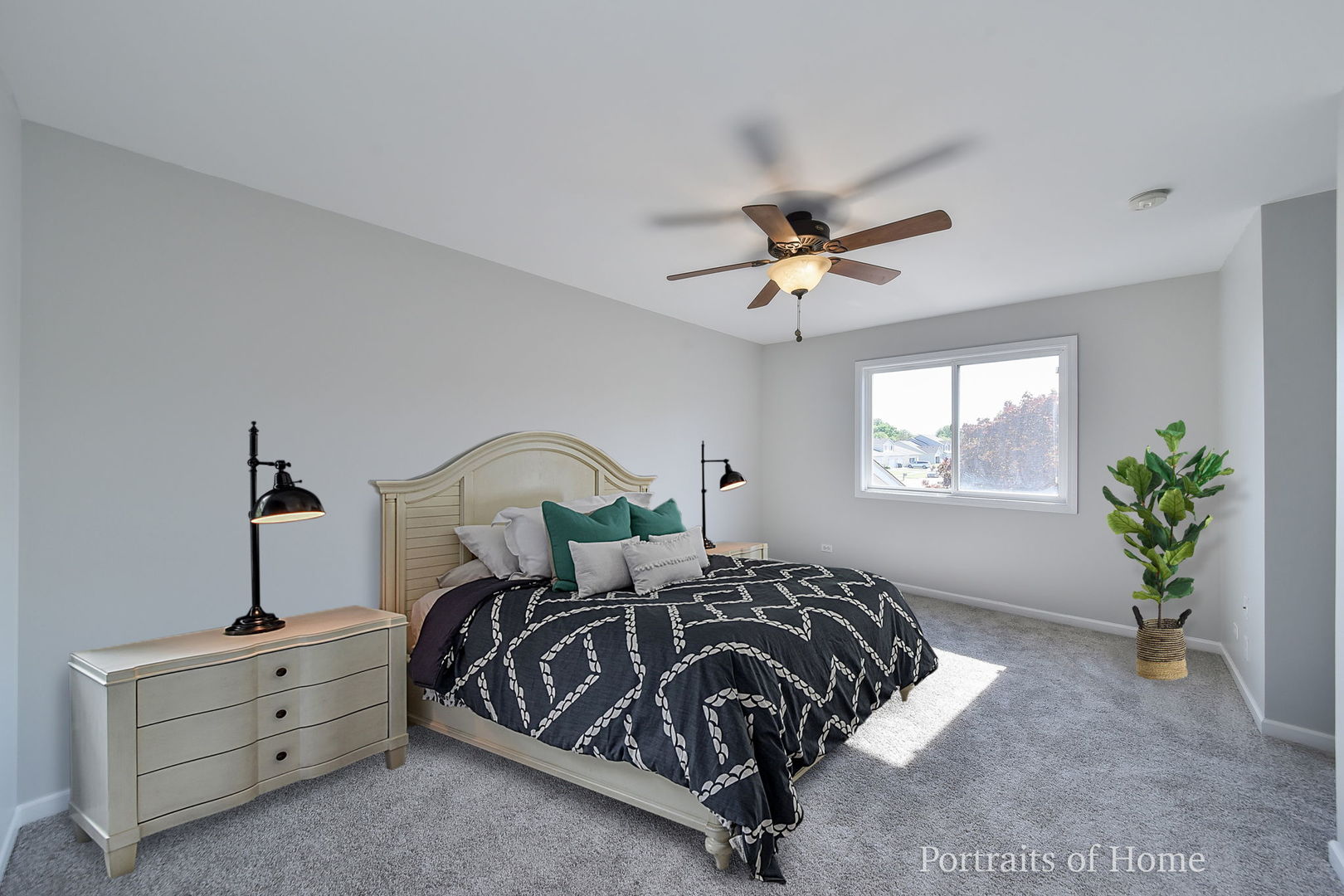 235 Rollin Road, Unit C Somonauk, IL 60552 - Photo 9 of 20 a bedroom with a bed and a window