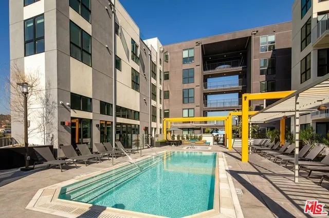 a roof deck with patio