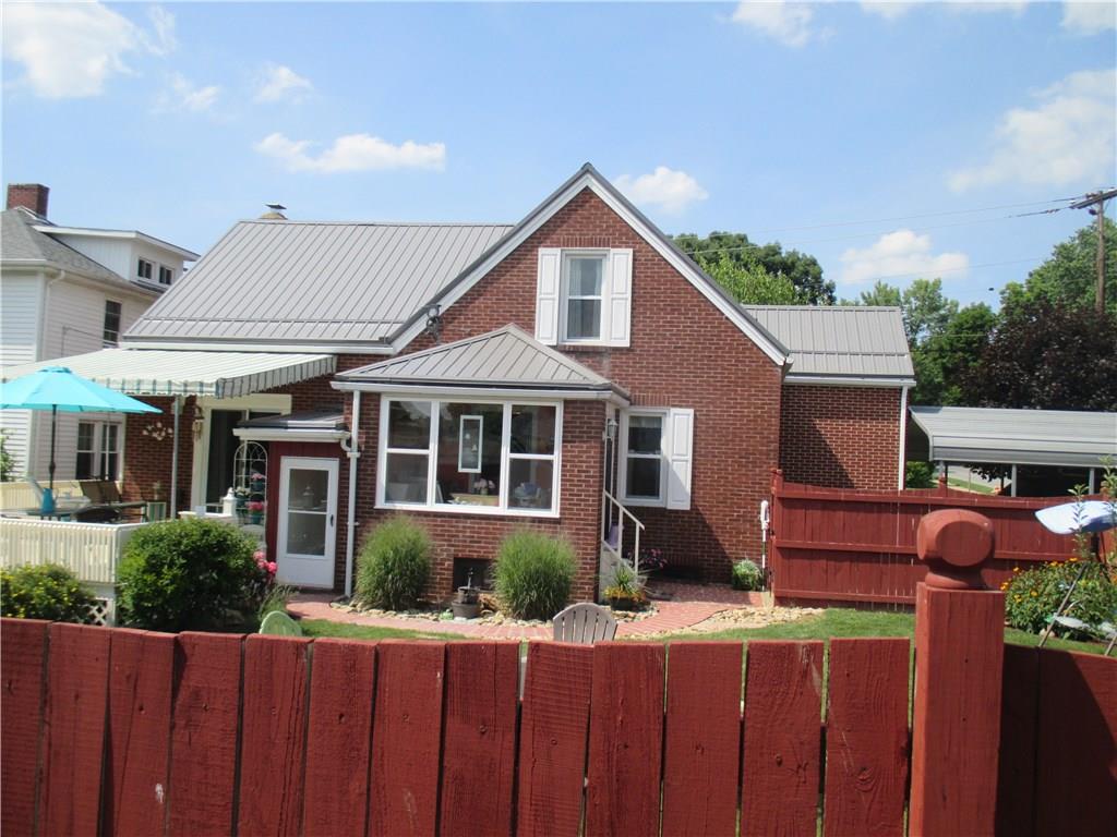 308 Chestnut Street Indiana, PA 15701 - Photo 24 of 25 CHECK OUT THAT NEW METAL ROOF AS YOU PEEK OVER THE FENCE