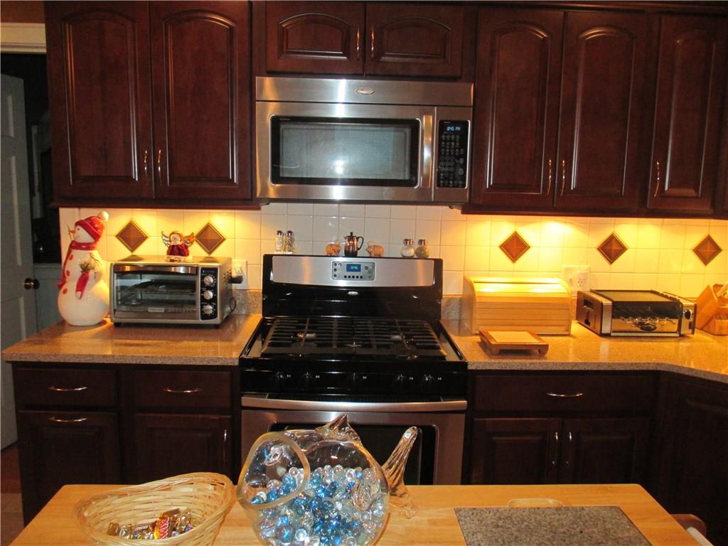 308 Chestnut Street Indiana, PA 15701 - Photo 8 of 25 KITCHEN WITH GAS STOVE AND MICROWAVE