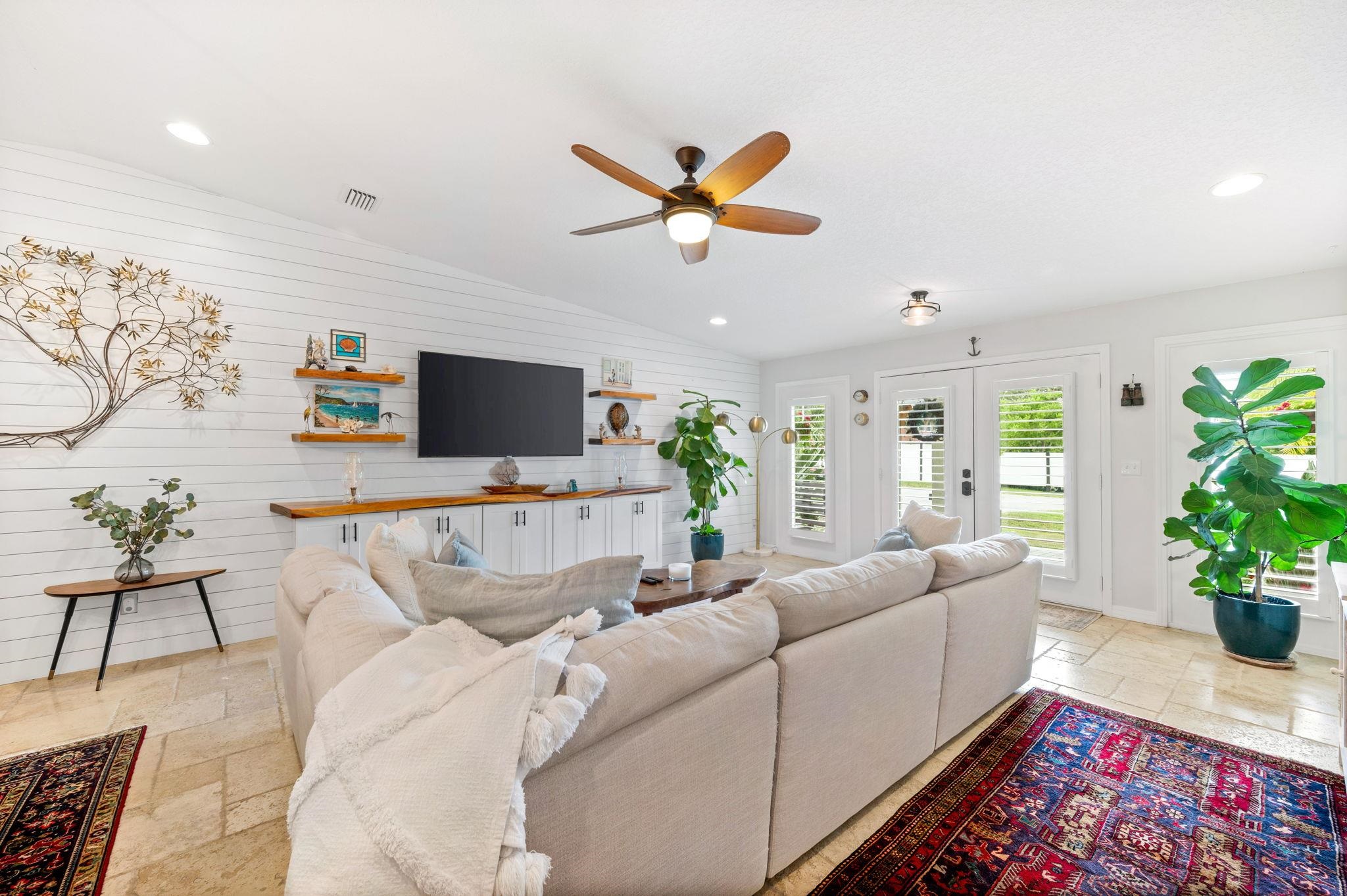 305 Mystical Way St. Augustine, FL 32080 - Photo 13 of 96 a living room with furniture and a flat screen tv