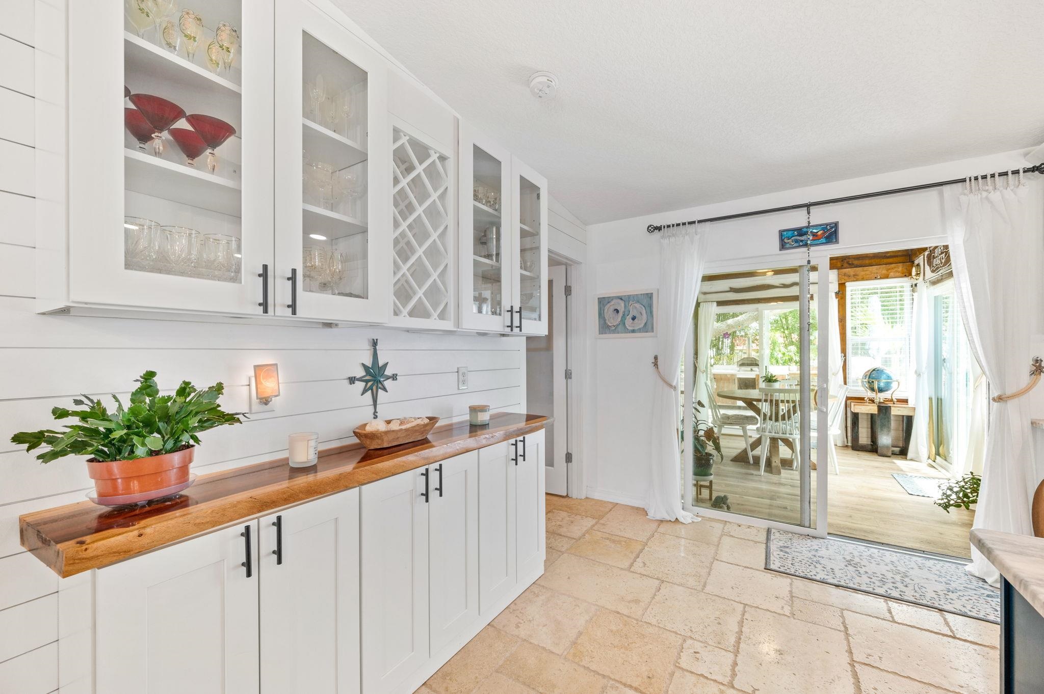 305 Mystical Way St. Augustine, FL 32080 - Photo 27 of 96 a kitchen with stainless steel appliances granite countertop a sink and a counter top space