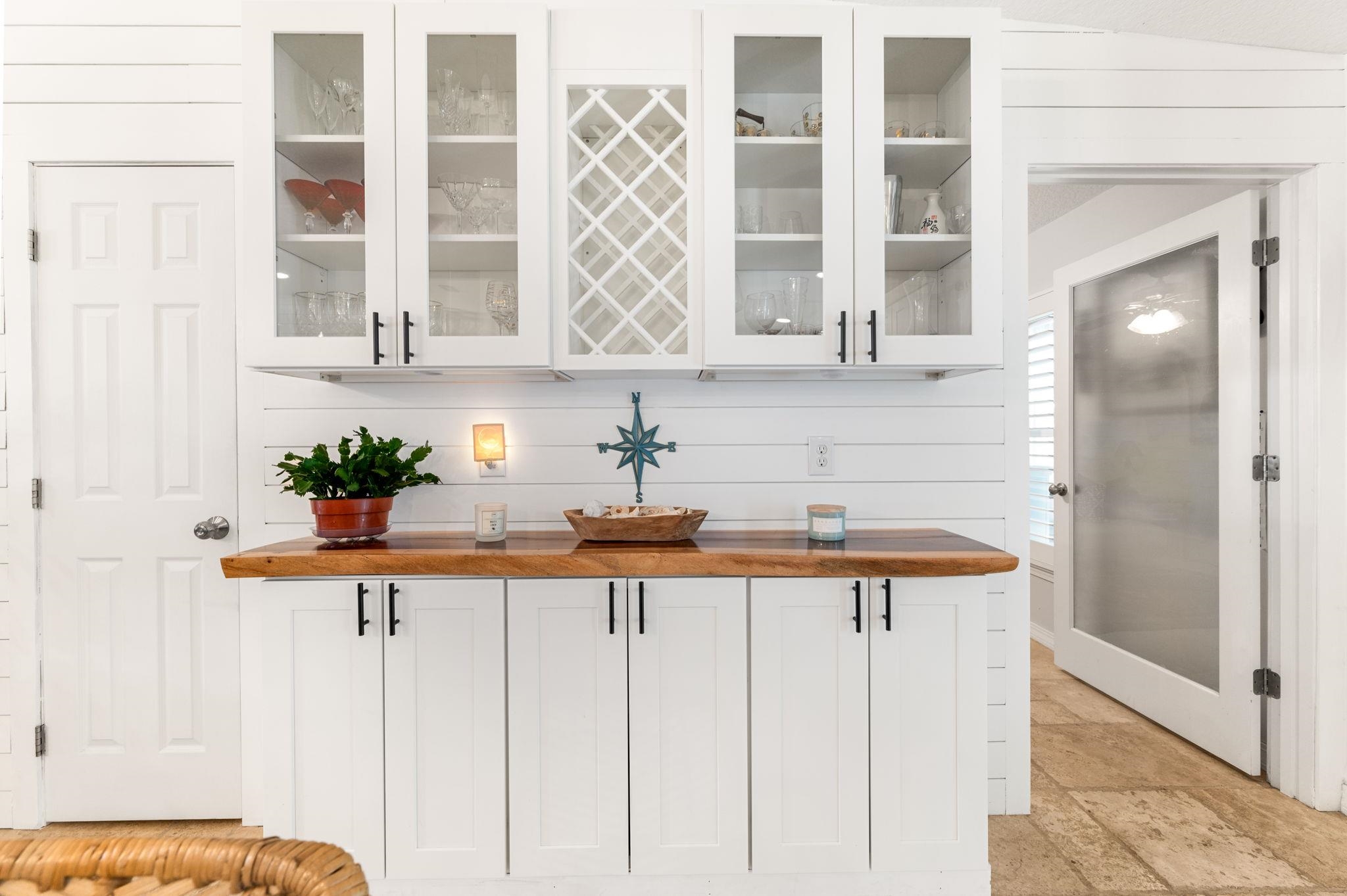305 Mystical Way St. Augustine, FL 32080 - Photo 36 of 96 a kitchen with stainless steel appliances granite countertop a sink and a white cabinets