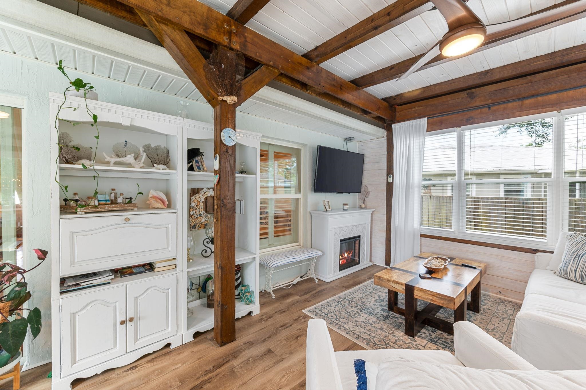 305 Mystical Way St. Augustine, FL 32080 - Photo 60 of 96 a living room with furniture fireplace and flat screen tv