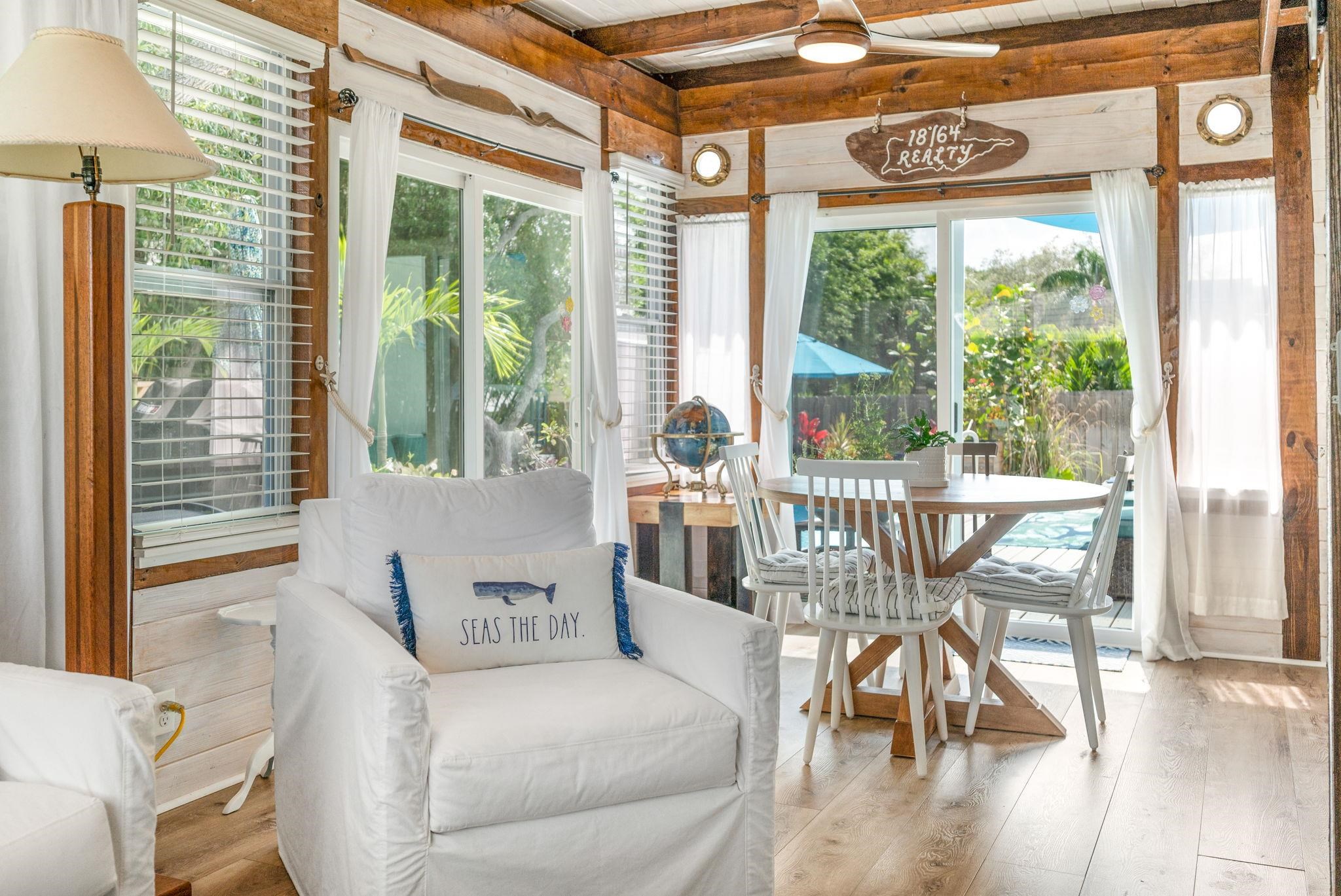 305 Mystical Way St. Augustine, FL 32080 - Photo 64 of 96 a view of a dining room with furniture window and outside view