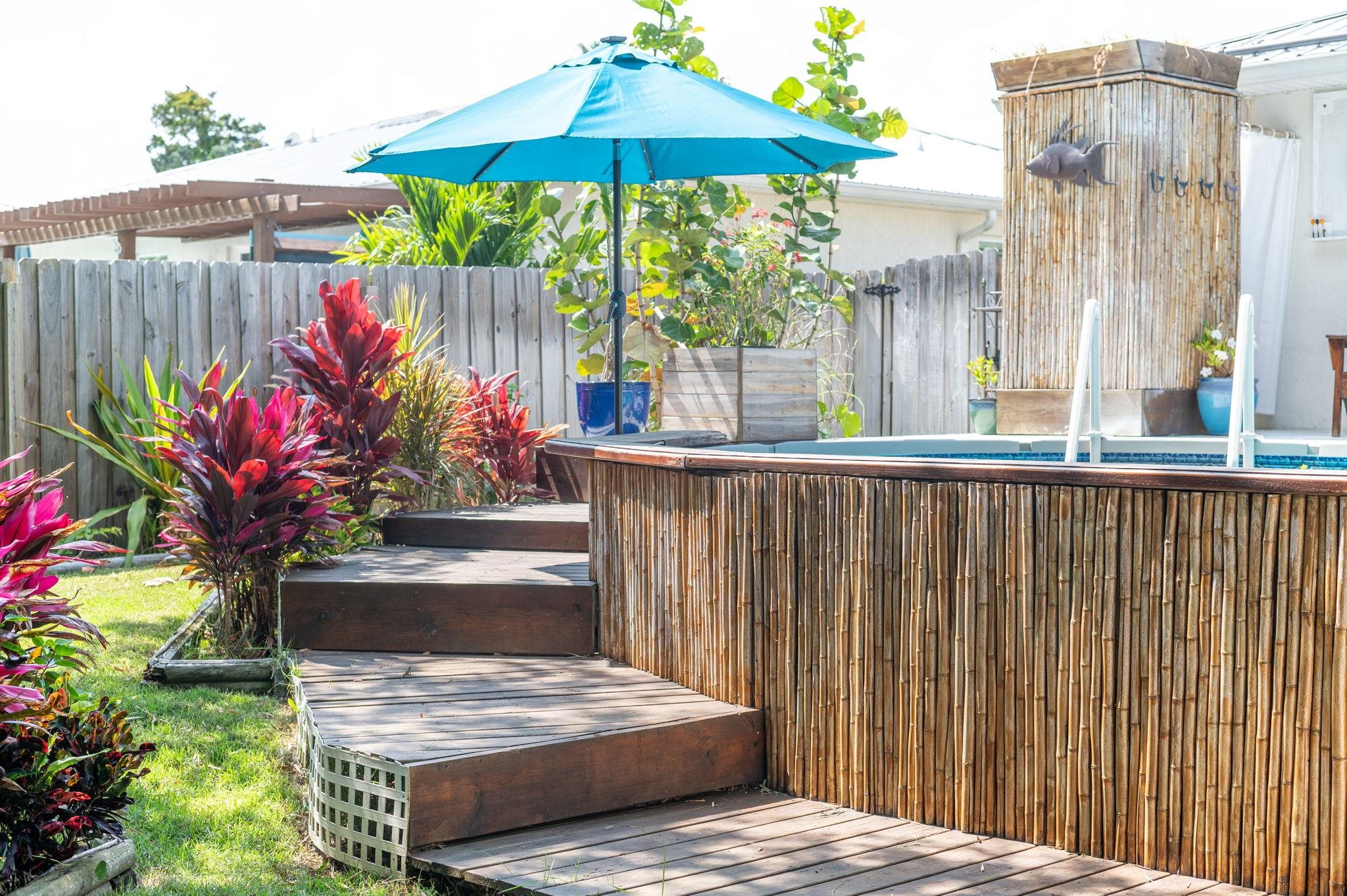 305 Mystical Way St. Augustine, FL 32080 - Photo 75 of 96 a view of a wooden door with a bench in patio