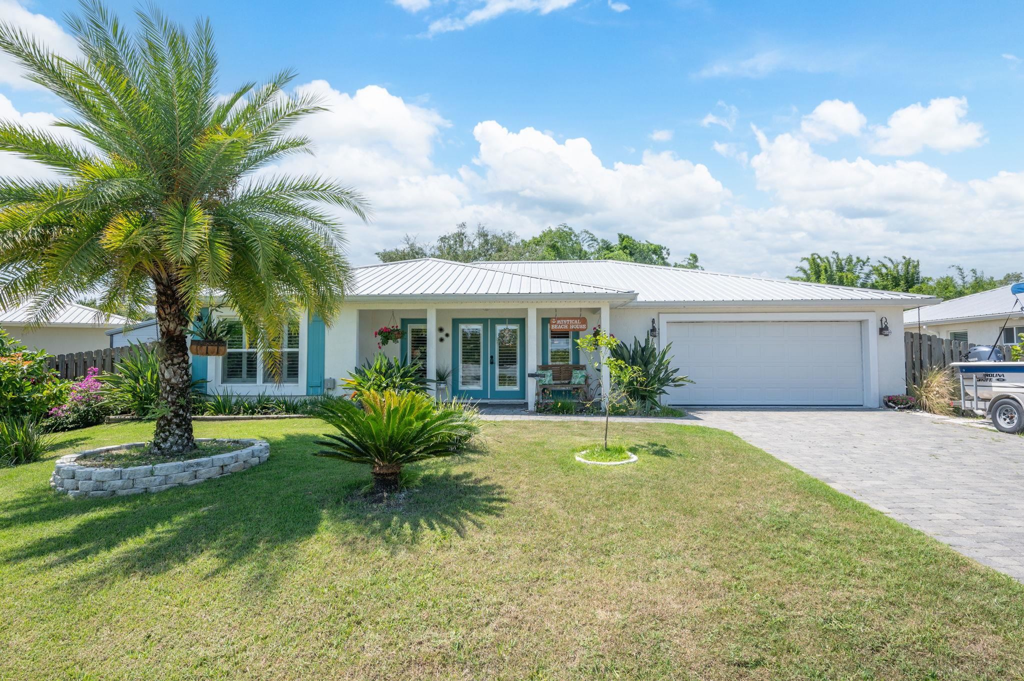 305 Mystical Way St. Augustine, FL 32080 - Photo 91 of 96 a view of house with outdoor space and swimming pool