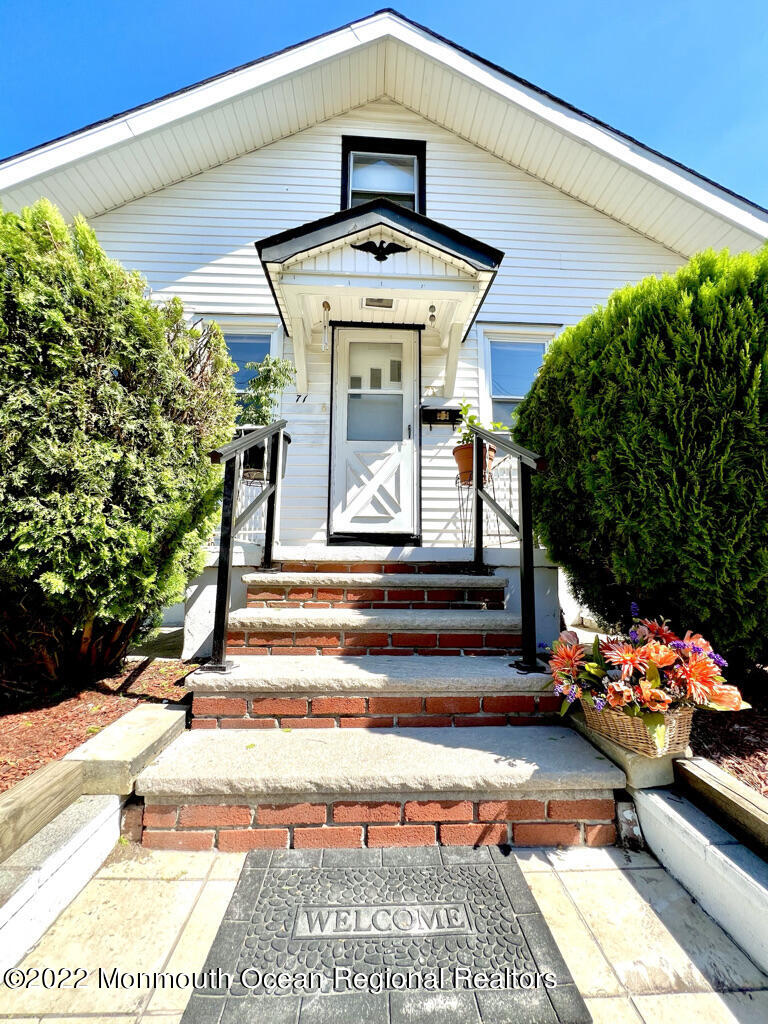 71 White Road Shrewsbury, NJ 07702 - Photo 23 of 26 a front view of a house with entryway