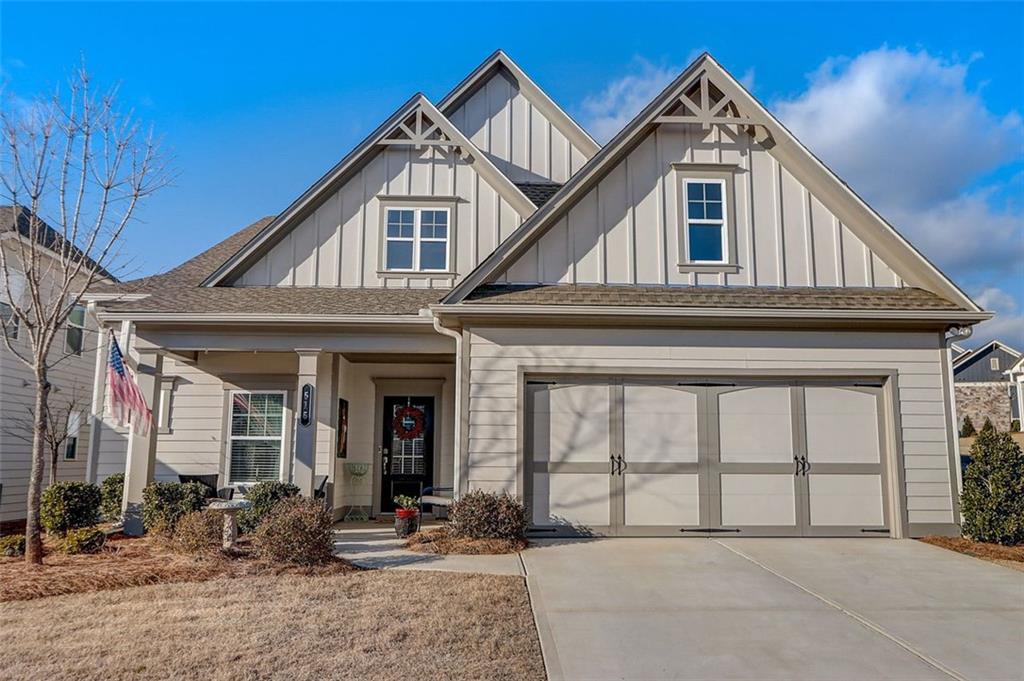 515 Forest Lane Canton, GA 30114 - Photo 1 of 1 a front view of a house with garden