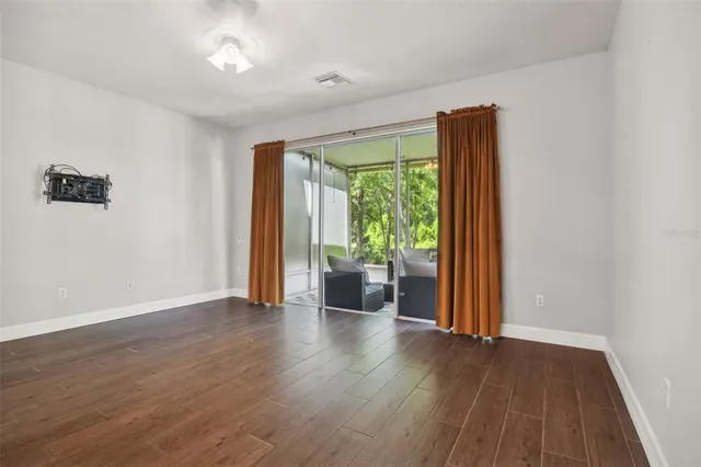 a white sink sitting under a bathroom mirror