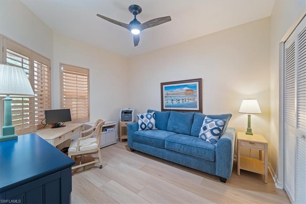6549 Marissa Loop, Unit 15 Naples, FL 34108 - Photo 12 of 24 a living room with furniture and a window