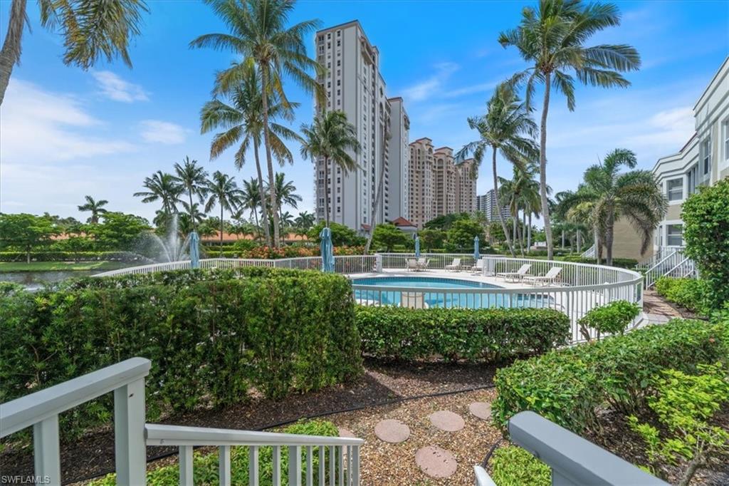 6549 Marissa Loop, Unit 15 Naples, FL 34108 - Photo 14 of 24 a view of a garden