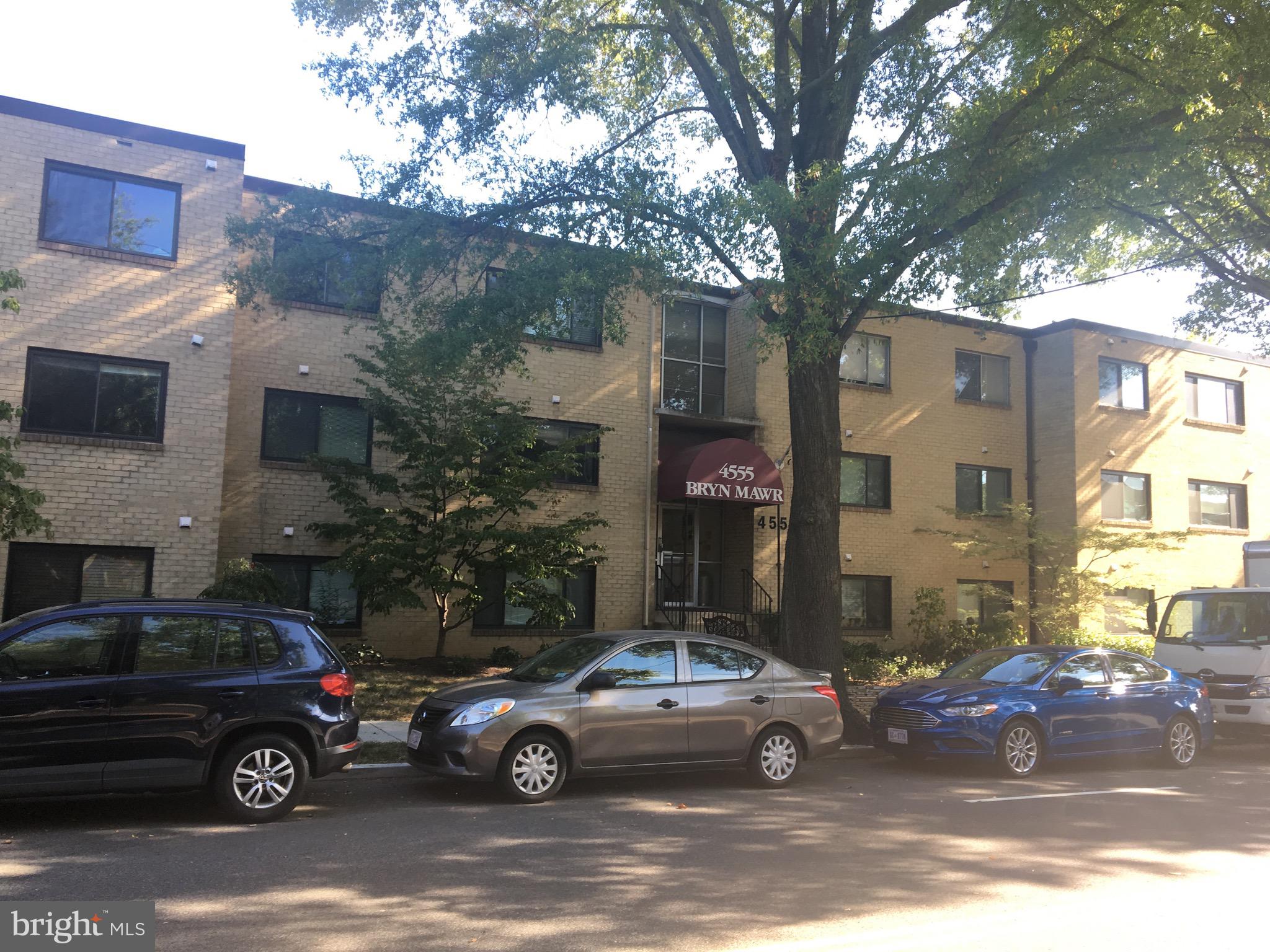a car parked in front of a house