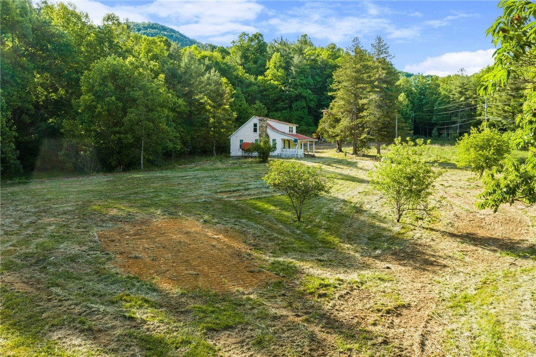 657 Lawrence Greene Road Deep Gap, NC 28618 - Photo 4 of 25 a view of a garden
