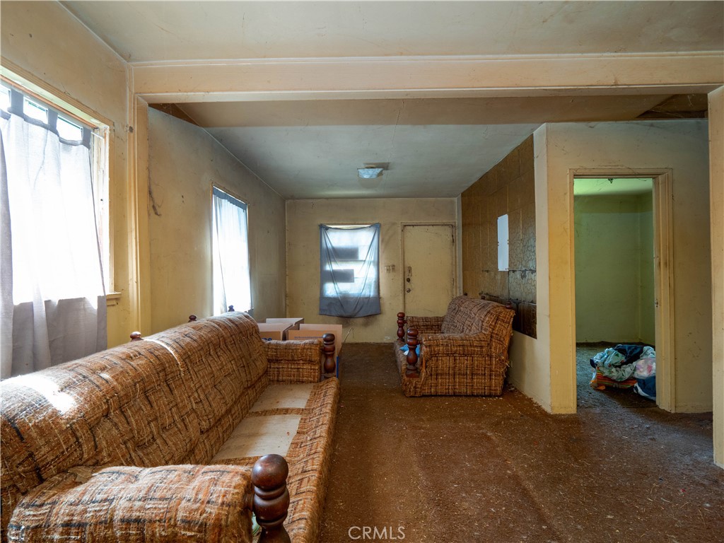 220 South Harris Avenue Compton, CA 90221 - Photo 5 of 18 a living room with furniture and a large window