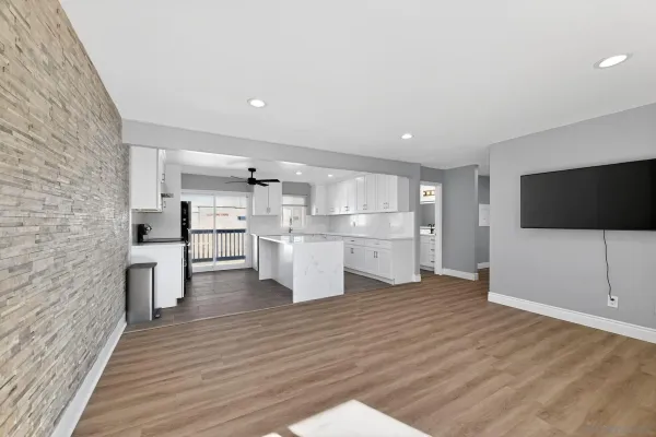 a view of kitchen with wooden floor