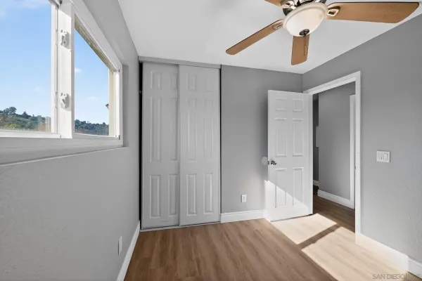 a view of an empty room and window