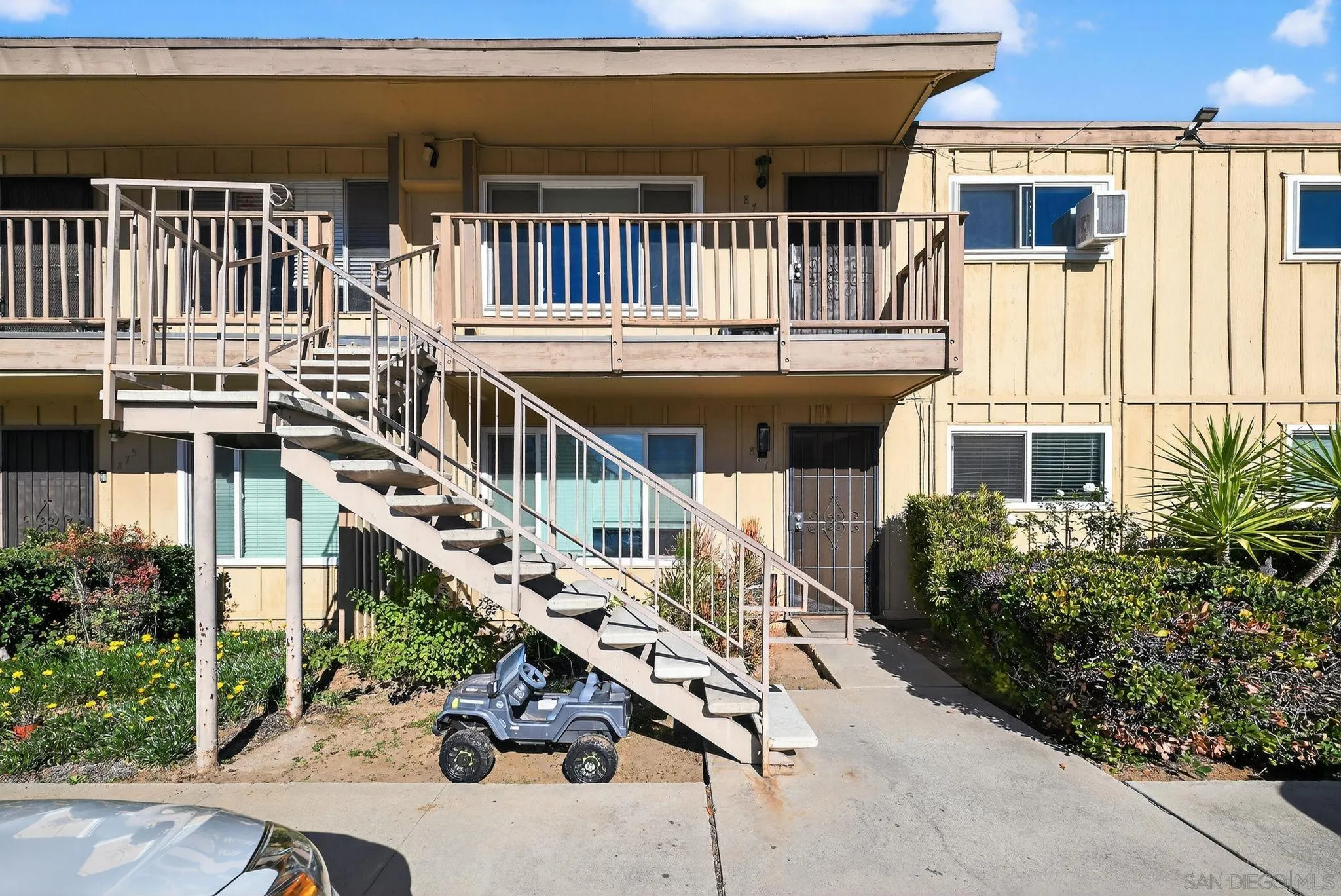 879 Jamacha Road El Cajon, CA 92019 - Photo 5 of 32 a view of a house with a small deck and furniture