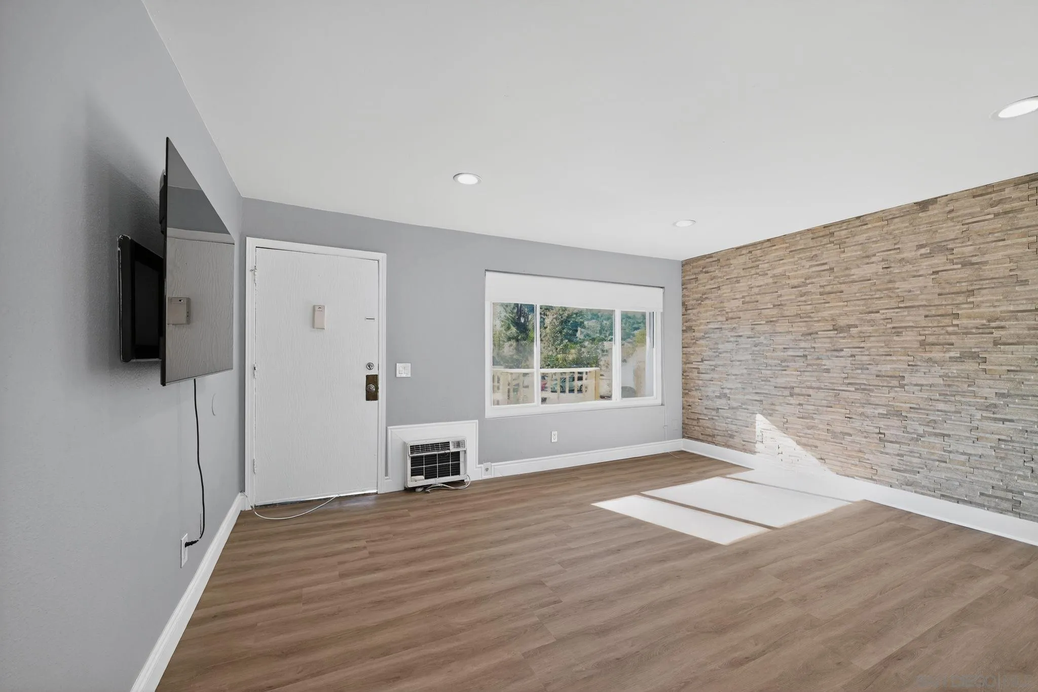 879 Jamacha Road El Cajon, CA 92019 - Photo 10 of 32 a view of empty room with wooden floor and fan