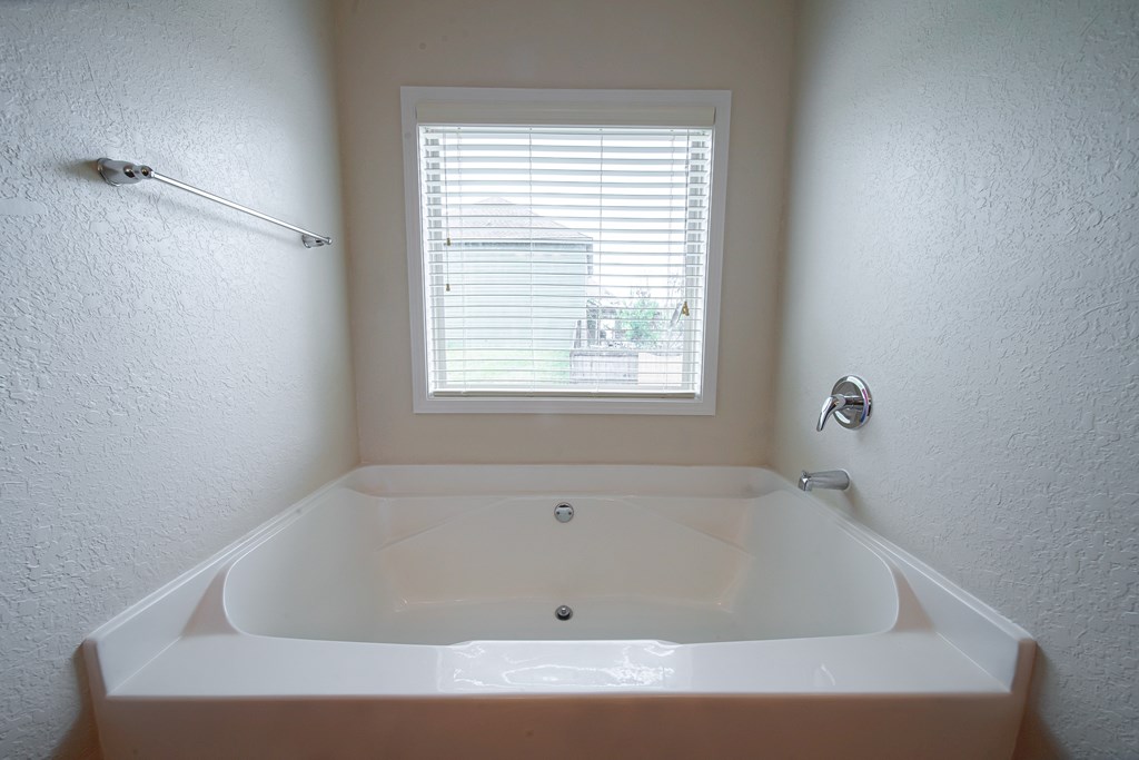 305 Owens Road Fort Mitchell, AL 36856 - Photo 21 of 44 a bathroom with a bathtub