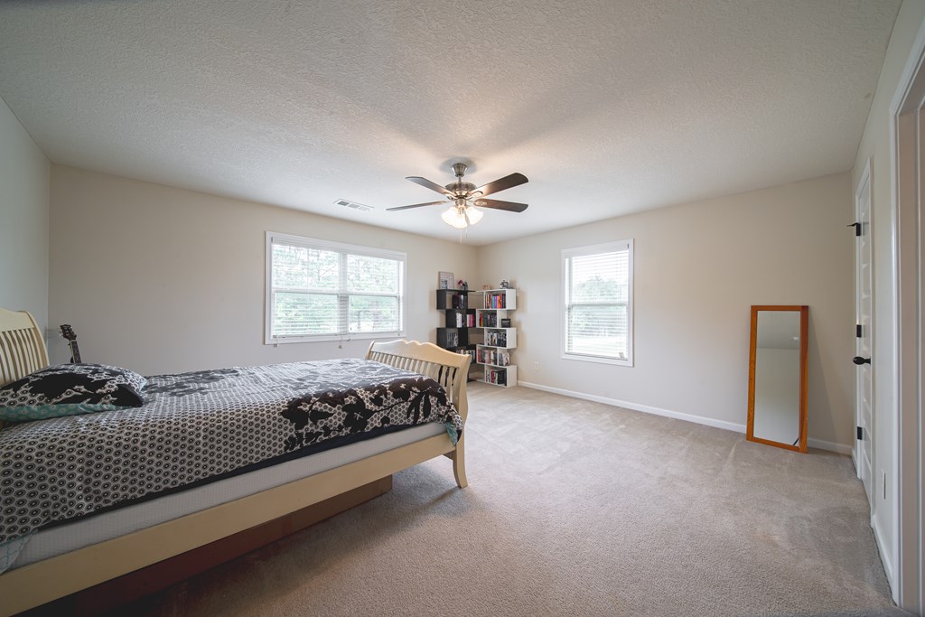305 Owens Road Fort Mitchell, AL 36856 - Photo 25 of 44 a bed room with a bed and a window